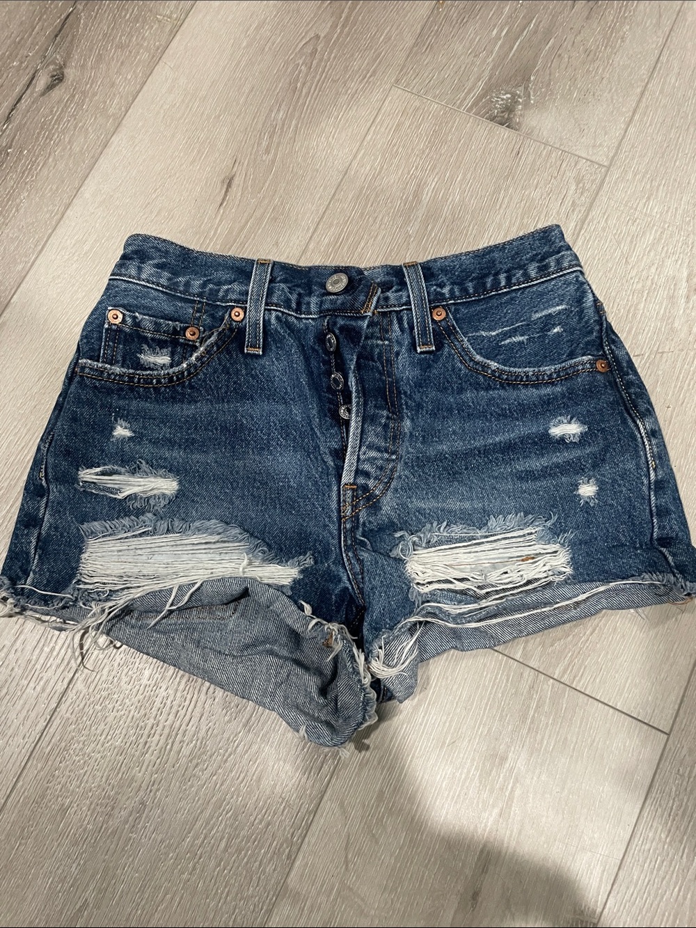 Levi's Distressed Dark Blue Denim Cutoff Shorts
